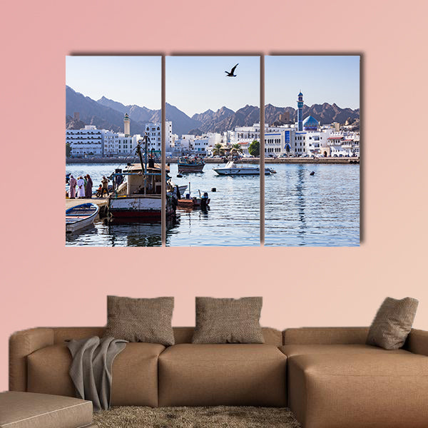 Fishermen at The Muttrah Fish docks in Muscat, Oman multi panel canvas wall art