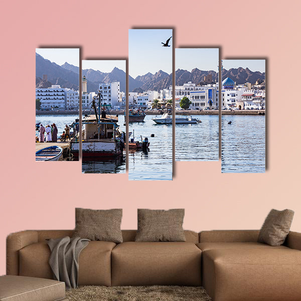 Fishermen at The Muttrah Fish docks in Muscat, Oman multi panel canvas wall art