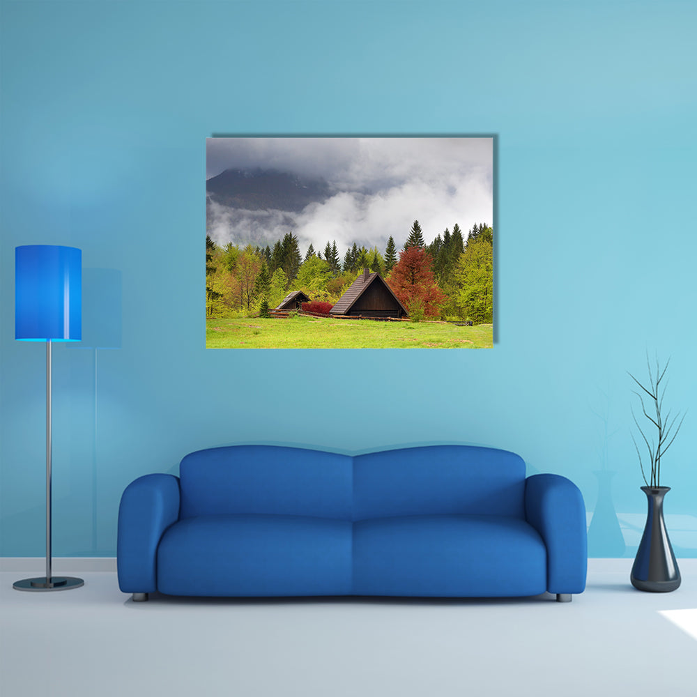 Mountain alps landscape with house and trees in fog clouds in Slovenia at spring multi panel canvas wall art