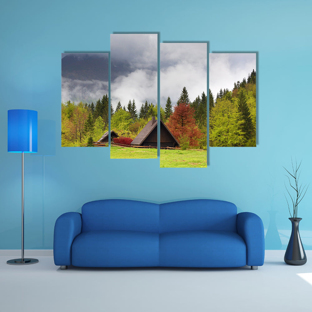 Mountain alps landscape with house and trees in fog clouds in Slovenia at spring multi panel canvas wall art
