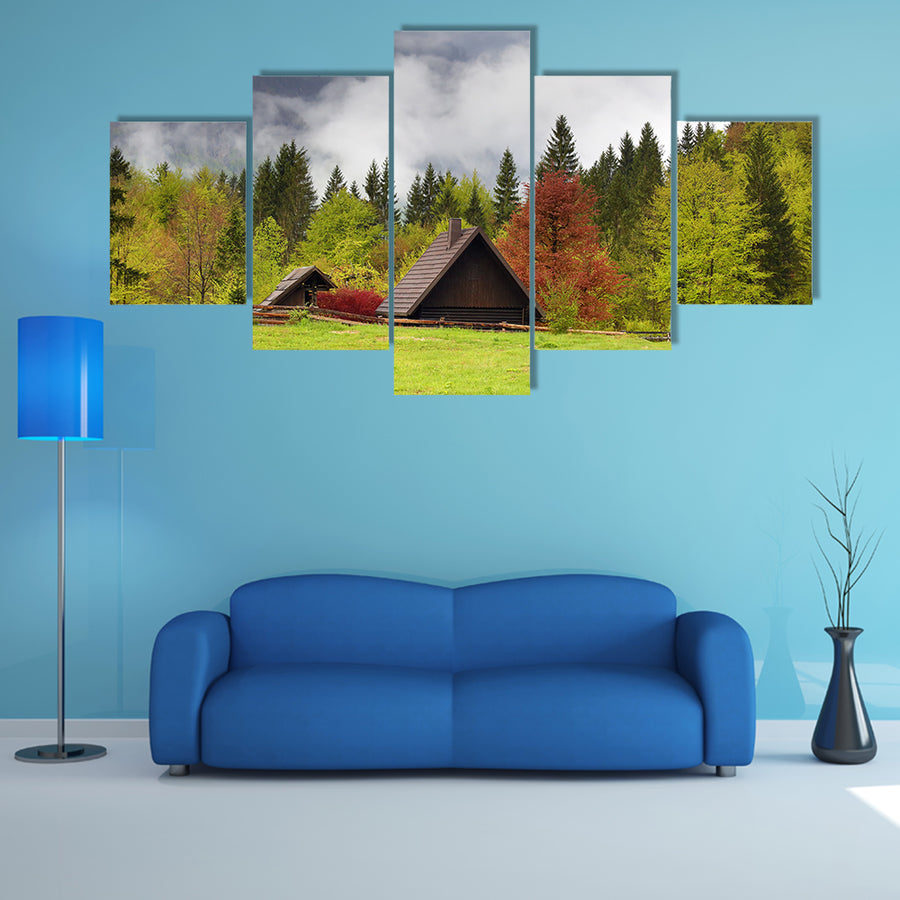 Mountain alps landscape with house and trees in fog clouds in Slovenia at spring multi panel canvas wall art