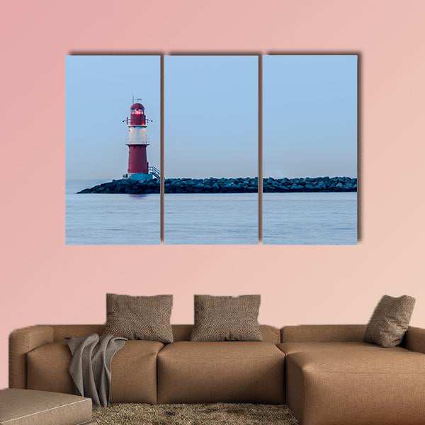 Night view of lighthouse of Warnemuende Germany multi panel canvas wall art