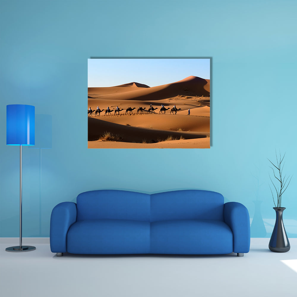 A Camel caravan going through the sand dunes in the Sahara Desert, Morocco multi panel canvas wall art