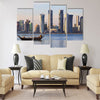 A dhow returns to harbour in Doha Qatar Multi panel canvas wall art