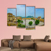 Unidentified people walking in the plaza and enjoying multi panel canvas wall art