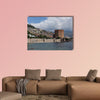 Seascape with Red tower and castle wall of Alanya shot on cloudy day multi panel canvas wall art