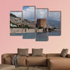 Seascape with Red tower and castle wall of Alanya shot on cloudy day multi panel canvas wall art