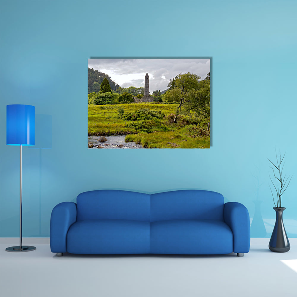 The view of valley and Round tower at Glendalough multi panel canvas wall art