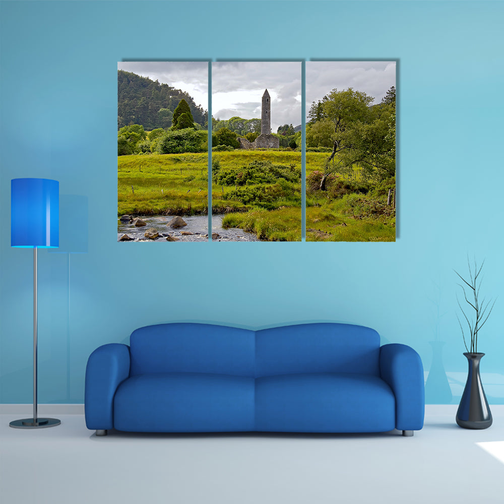 The view of valley and Round tower at Glendalough multi panel canvas wall art