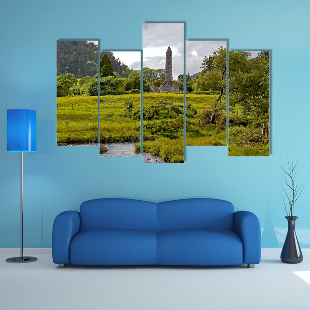 The view of valley and Round tower at Glendalough multi panel canvas wall art