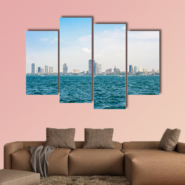 Speed boats and city buildings near the sea, sky and clouds  wall art