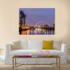 Night lights and the Clyde Arc Bridge at Glasgow City in Scotland over river. Multi Panel Canvas Wall Art