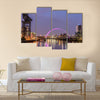 Night lights and the Clyde Arc Bridge at Glasgow City in Scotland over river. Multi Panel Canvas Wall Art