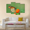 A beautiful Monarch Butterfly feeding on a Lantana bloom Multi Panel Canvas Wall Art