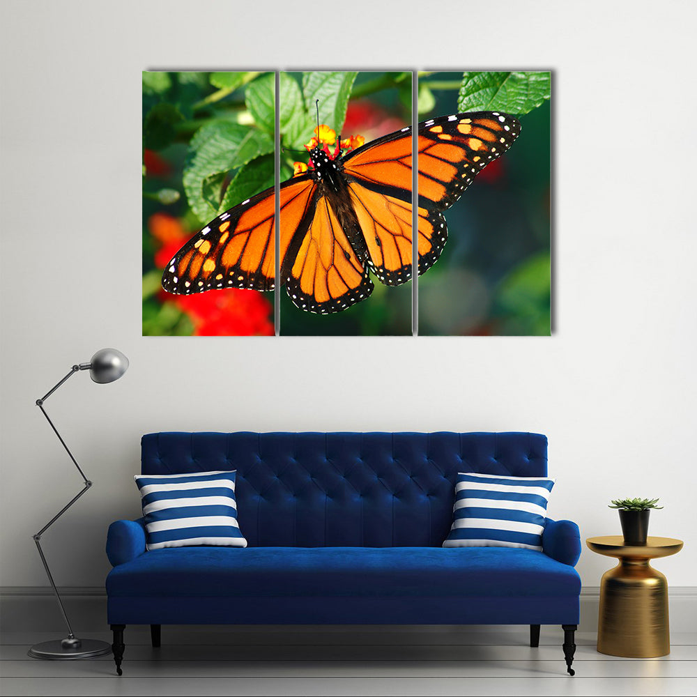 A Beautiful Butterfly With Vibrant Color, On A Lantha Bloom, Multi Panel Canvas Wall Art