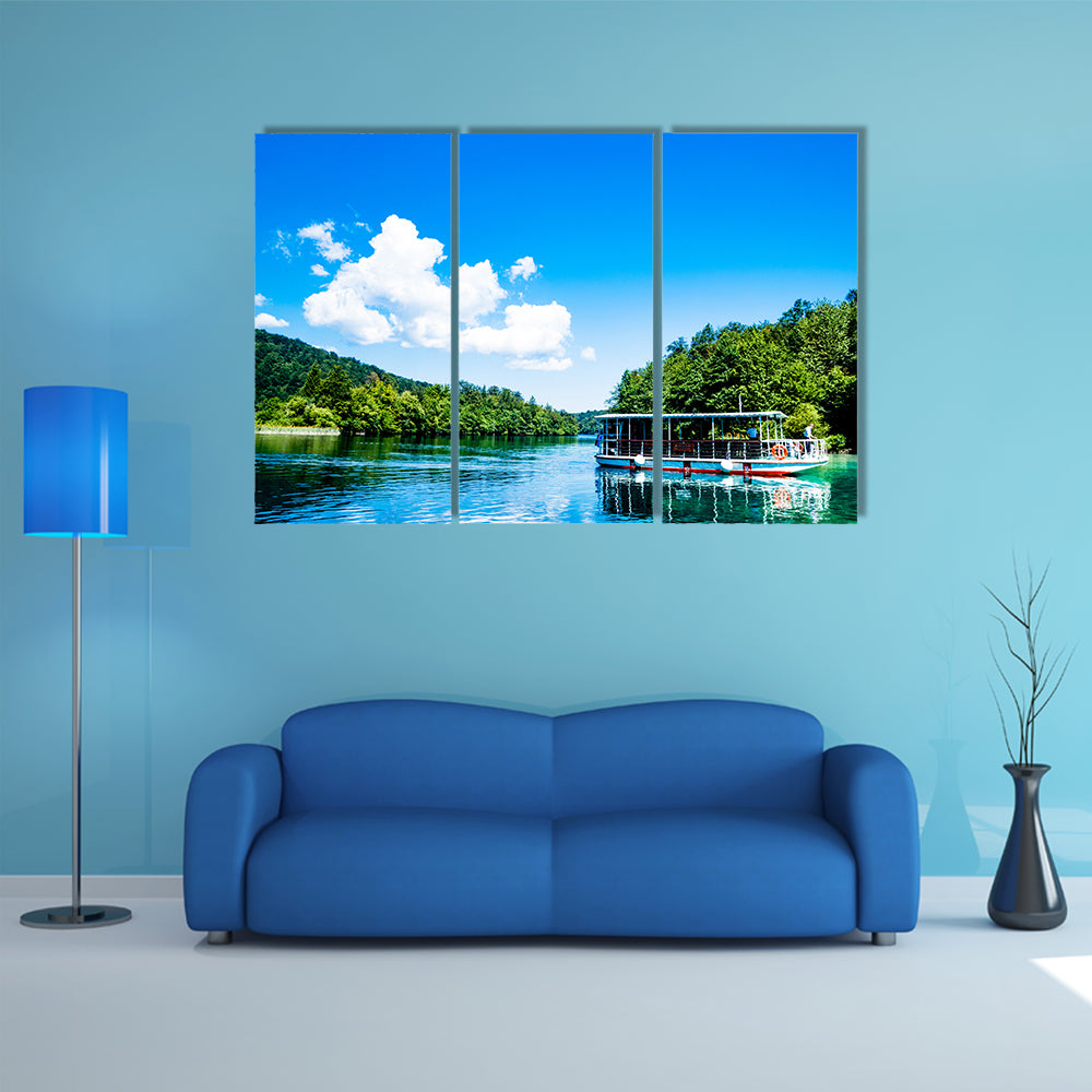 Boat Reflexion In The Plitvice Lakes In Croatia Multi Panel Canvas Wall Art
