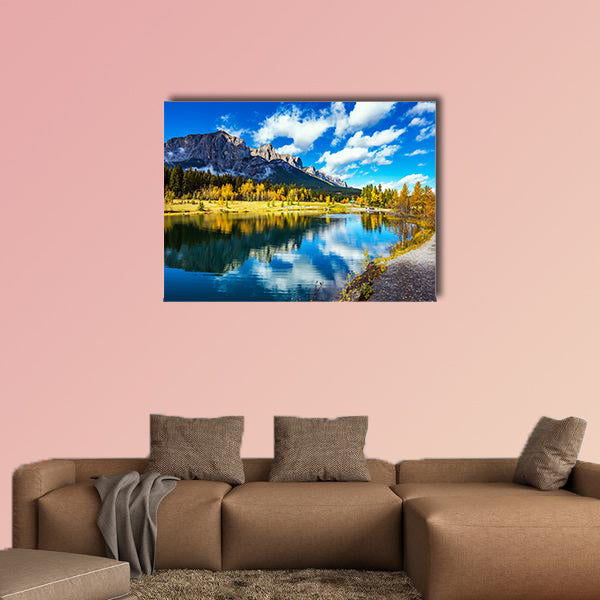 The path and yellowing aspens surround the lake multi panel canvas wall art