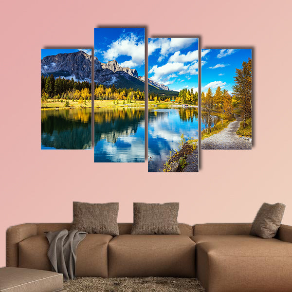 The path and yellowing aspens surround the lake multi panel canvas wall art
