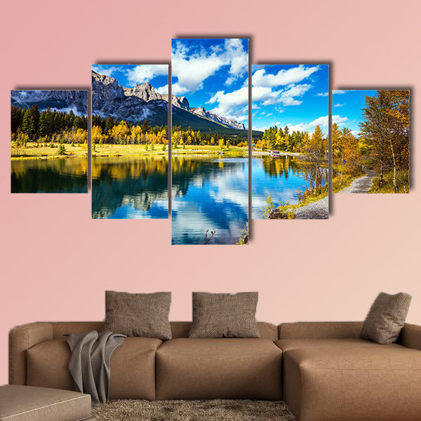 The path and yellowing aspens surround the lake multi panel canvas wall art
