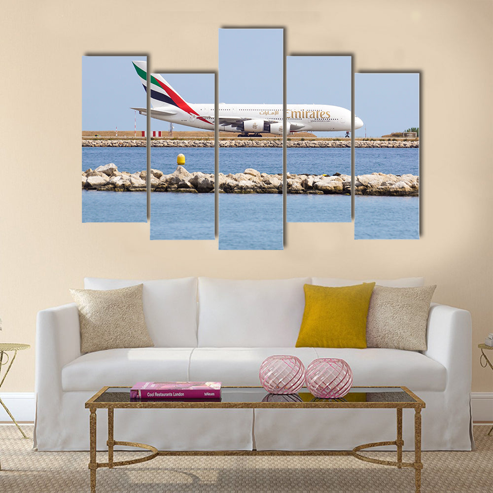 Emirates A380-861 double-decker wide-body passenger plane (A6-EDX) taxiing on International Airport multi panel canvas wall art