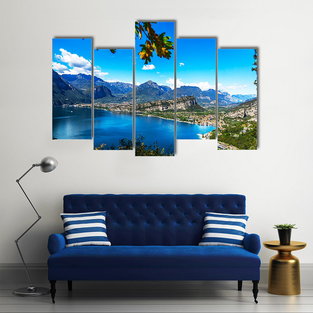A picturesque outlook over the mountains at lake garda multi panel canvas wall art