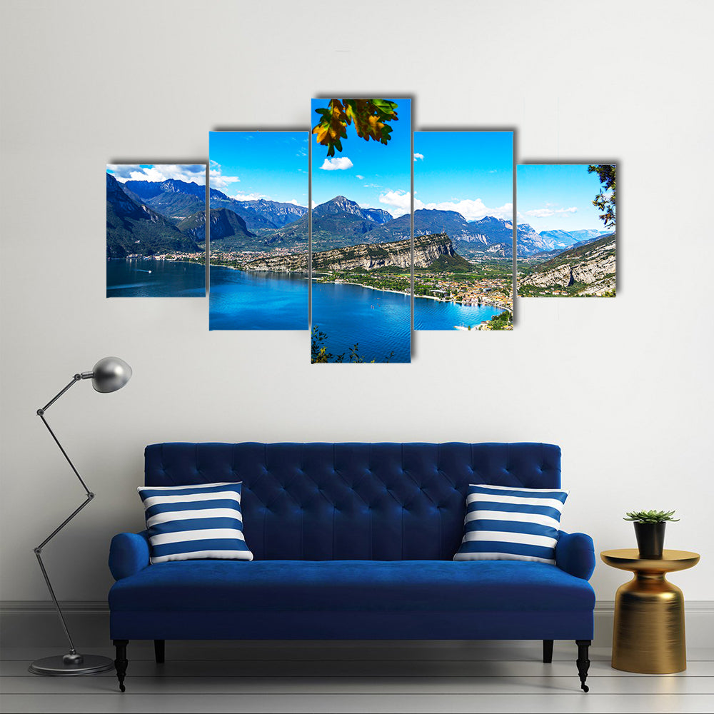 A picturesque outlook over the mountains at lake garda multi panel canvas wall art