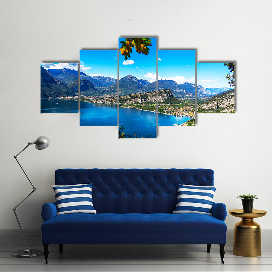 A picturesque outlook over the mountains at lake garda multi panel canvas wall art