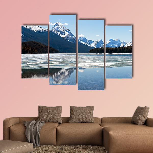 Snow covered Rocky mountains peaks reflected on the half wall art