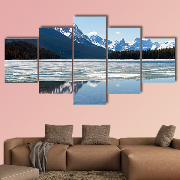 Snow covered Rocky mountains peaks reflected on the half wall art
