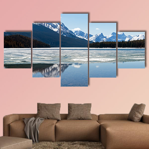 Snow covered rocky mountains peaks reflected canvas wall art