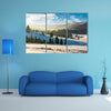 The forested hills of mountain ridge in winter multi panel canvas wall art