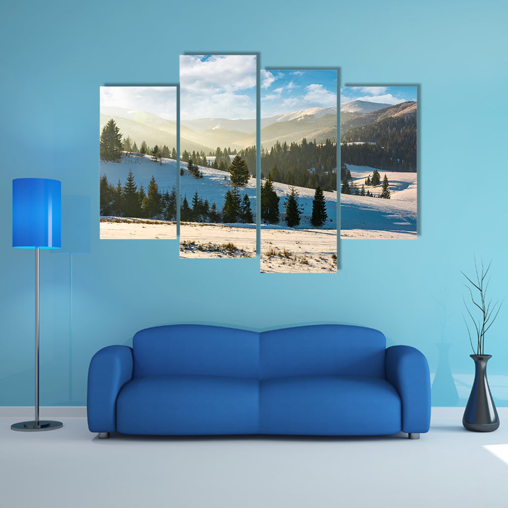 The forested hills of mountain ridge in winter multi panel canvas wall art