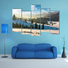 The forested hills of mountain ridge in winter multi panel canvas wall art