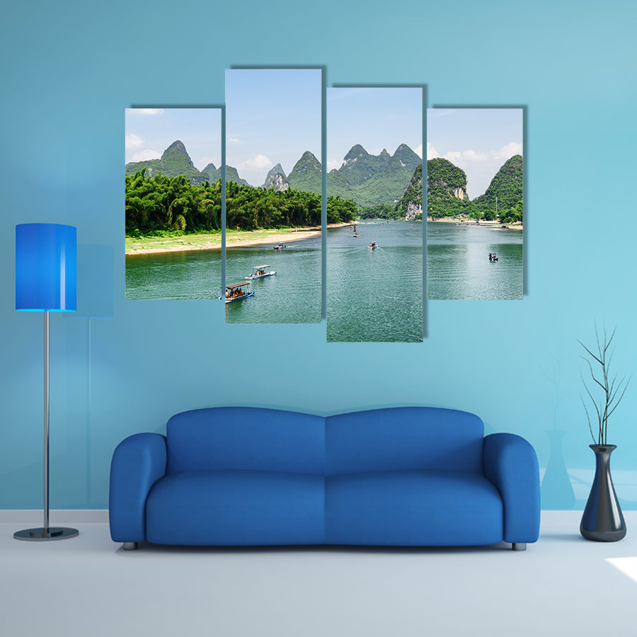 Scenic view of tourist motorized rafts on the Li River Lijiang River multi panel canvas wall art