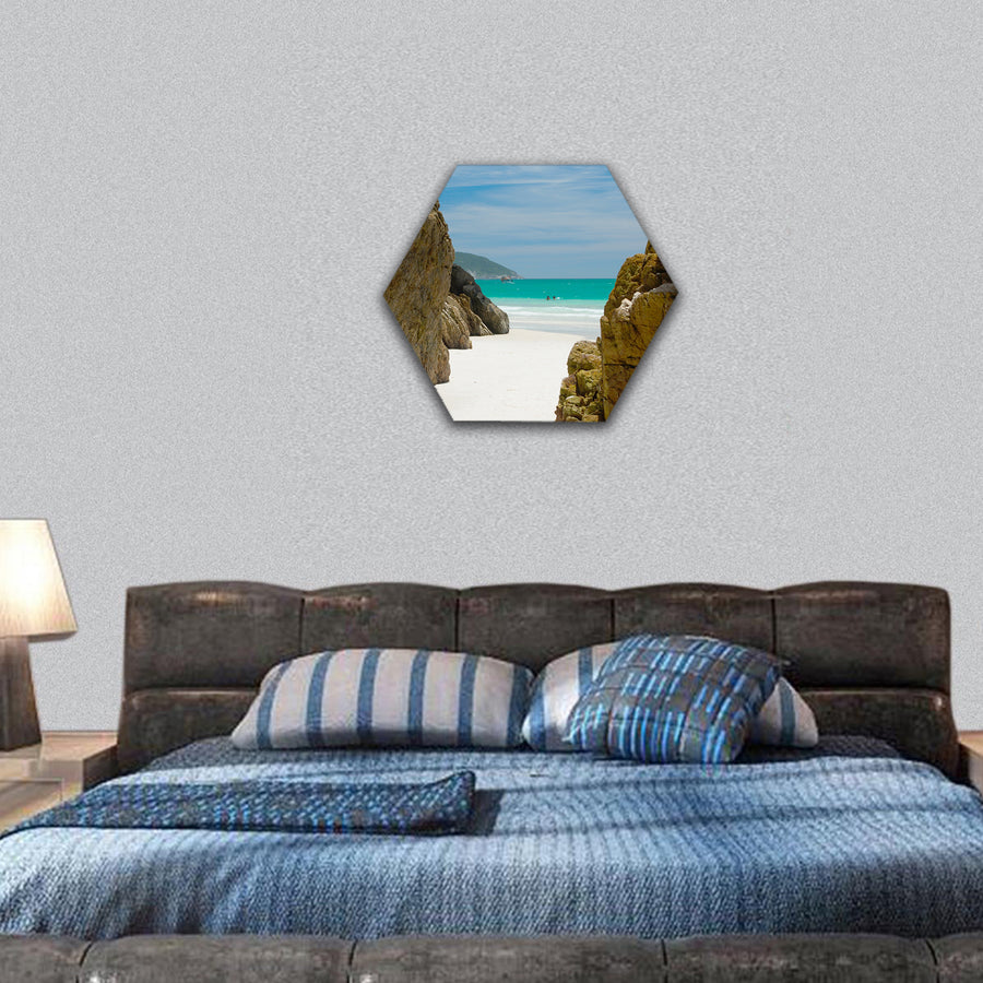 Cave in the rocks in a Crystalline clear waters hexagonal canvas wall art