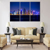 Qatar. Doha skyscrapers with external lighting Multi panel canvas wall art