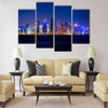 Qatar. Doha skyscrapers with external lighting Multi panel canvas wall art