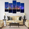 Qatar. Doha skyscrapers with external lighting Multi panel canvas wall art