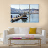 Fishermen at The Muttrah Fish docks multi panel canvas wall art