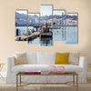 Fishermen at The Muttrah Fish docks multi panel canvas wall art