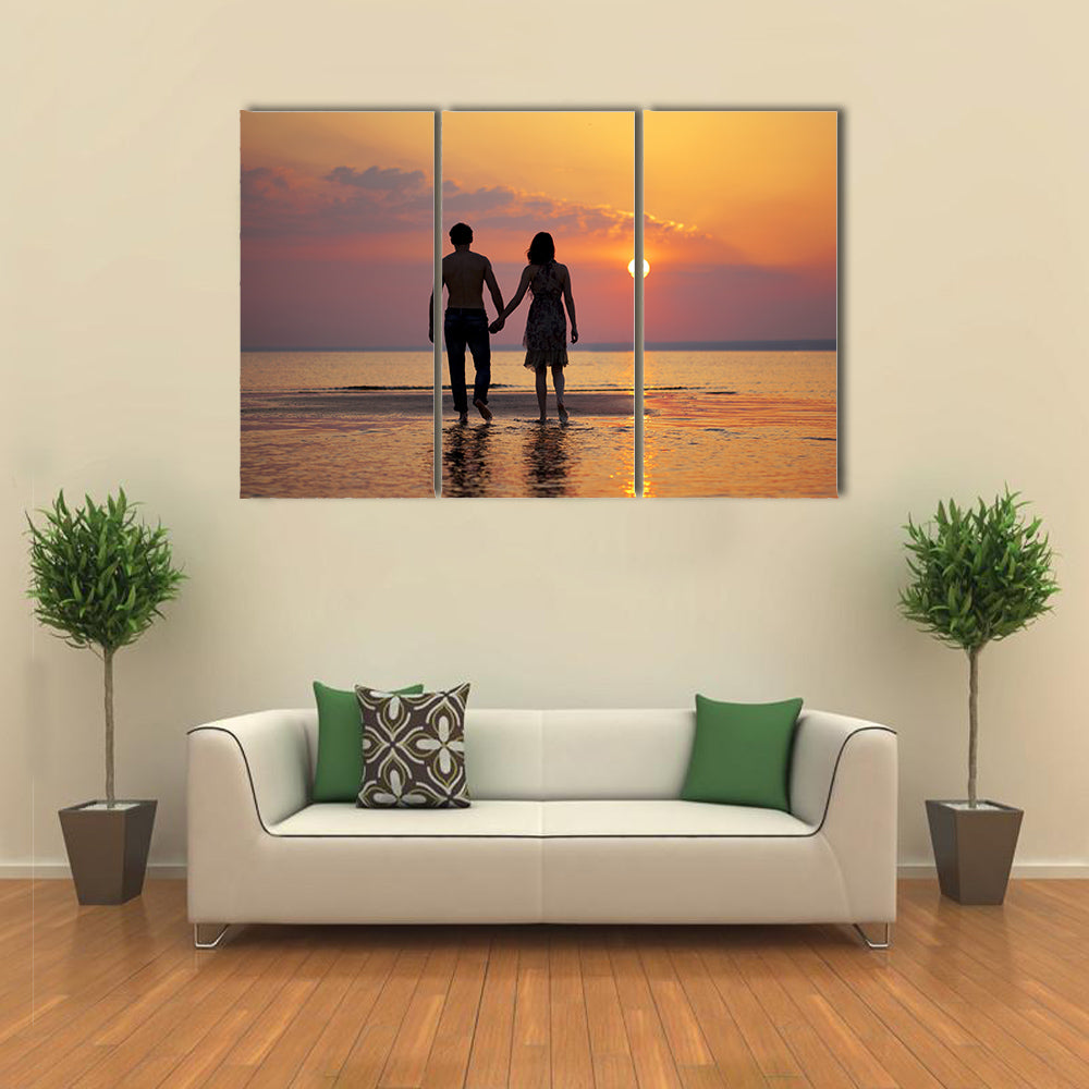 The image of two people in love at sunset multi panel canvas wall art