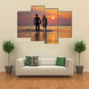 The image of two people in love at sunset multi panel canvas wall art