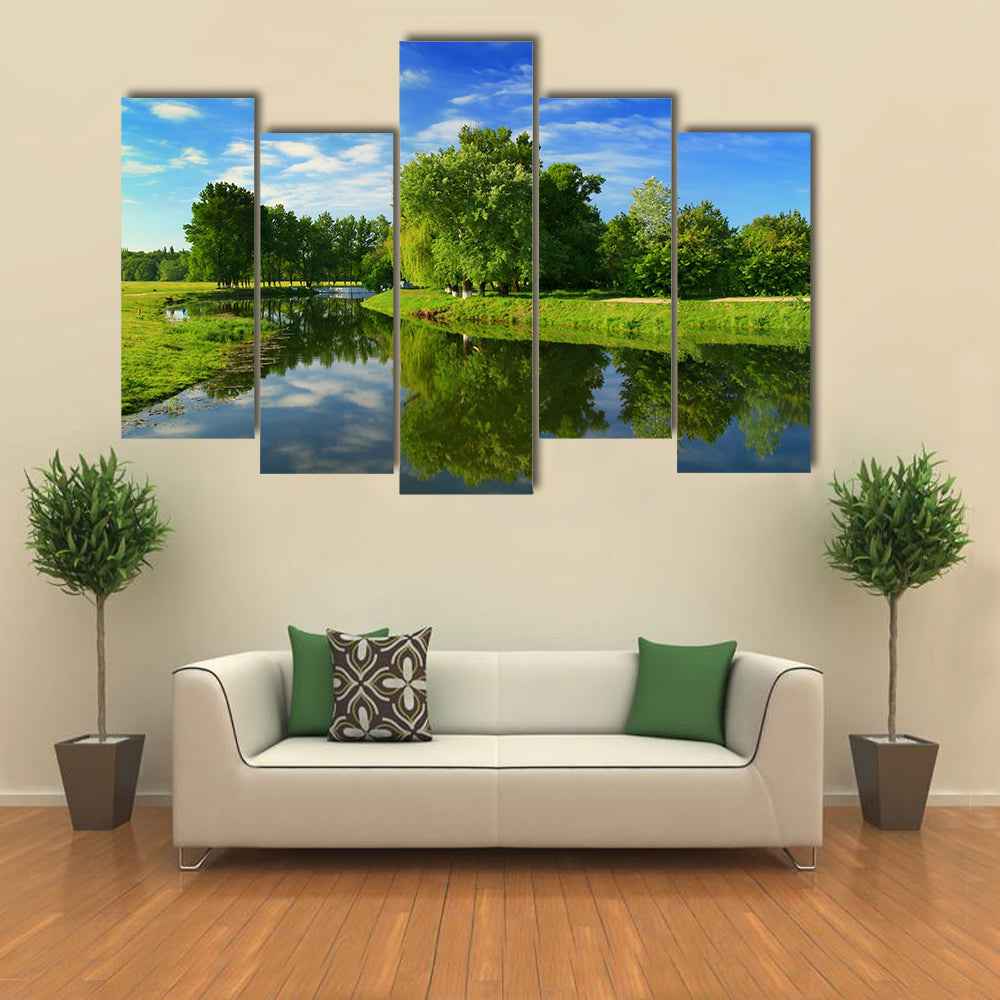 Reflection of trees in the river at dawn multi panel canvas wall art