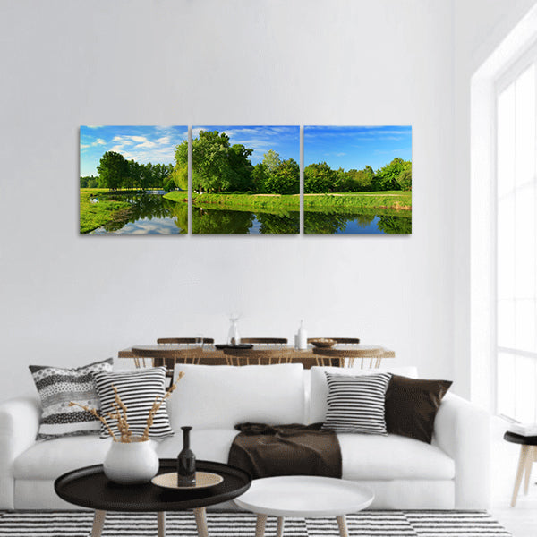 Reflection of trees in the river at dawn Panoramic Canvas Wall Art
