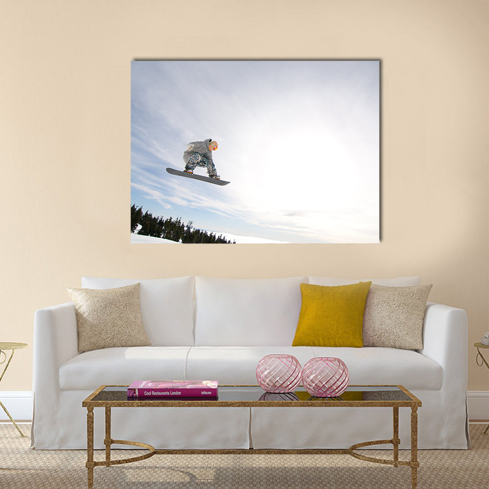 Men Snowboarder Catches Big Air on a Bright Sunny Day Multi panel canvas wall art