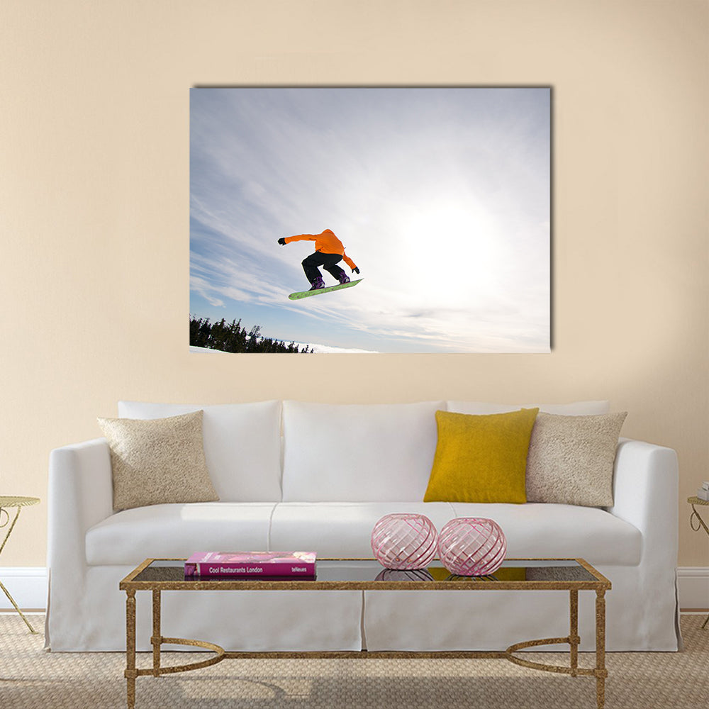 Male Snowboarder Catches Big Air on a Bright Sunny Day Multi panel canvas wall art