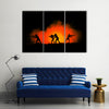 Military silhouettes of soldiers against the backdrop Multi panel canvas wall art