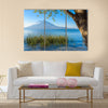 Wooden pier at Lake Atitlan on the shore at Panajachel Guatemala Multi panel canvas wall art