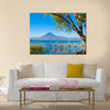 Wooden pier at Lake Atitlan on the shore at Panajachel, Guatemala Multi panel canvas wall art