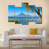 Wooden pier at Lake Atitlan on the shore at Panajachel, Guatemala Multi panel canvas wall art